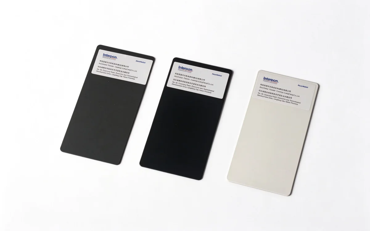 Flat Grey, Flat Black and Pearl White powder-coated finish samples